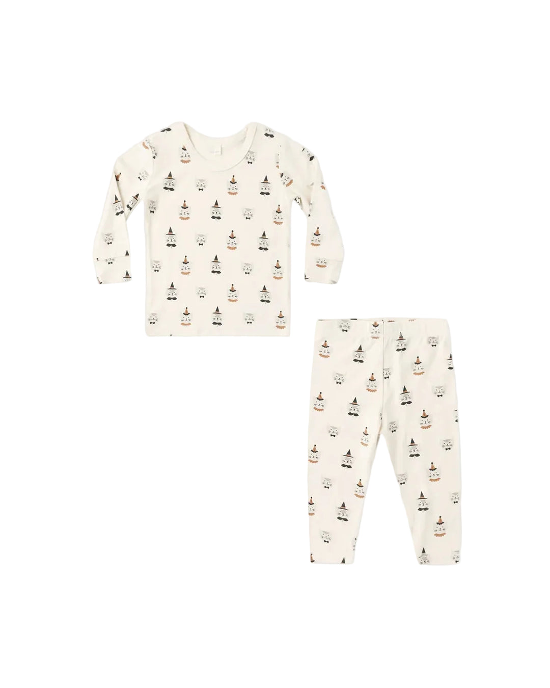 A two-piece baby pajama set featuring a long-sleeve top and matching pants in a warm cream color, both printed with a small, repeating pattern of festive Christmas trees and ornaments.