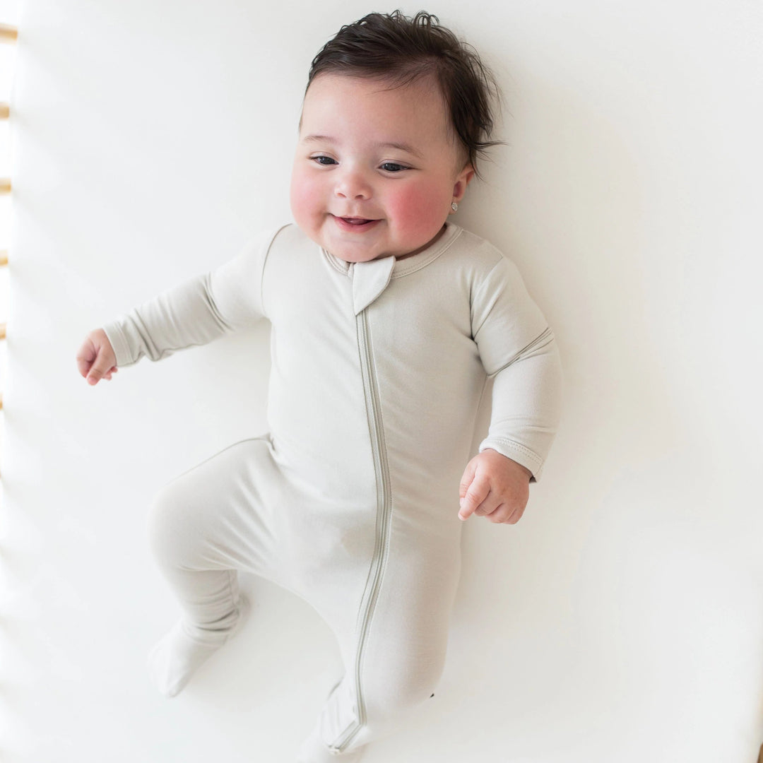KYTE BABY zippered footie in oat