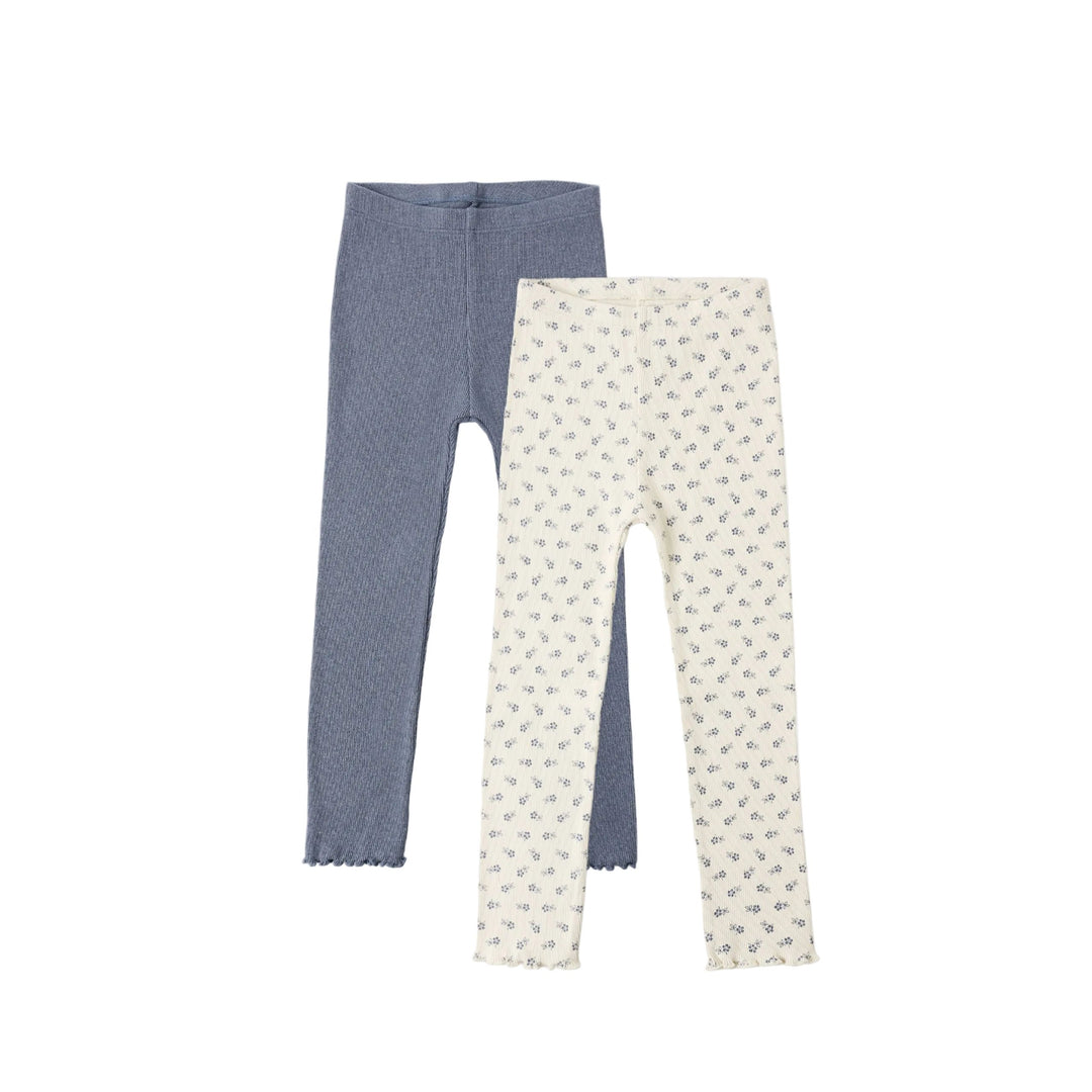 Two pairs of leggings, one blue and one white with a ditsy floral pattern, on a white background.