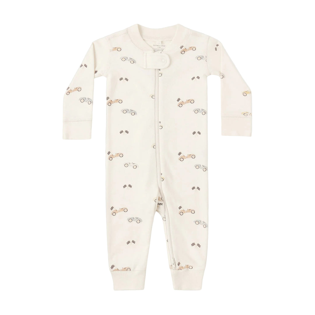 Baby onesie with car pattern on a white background