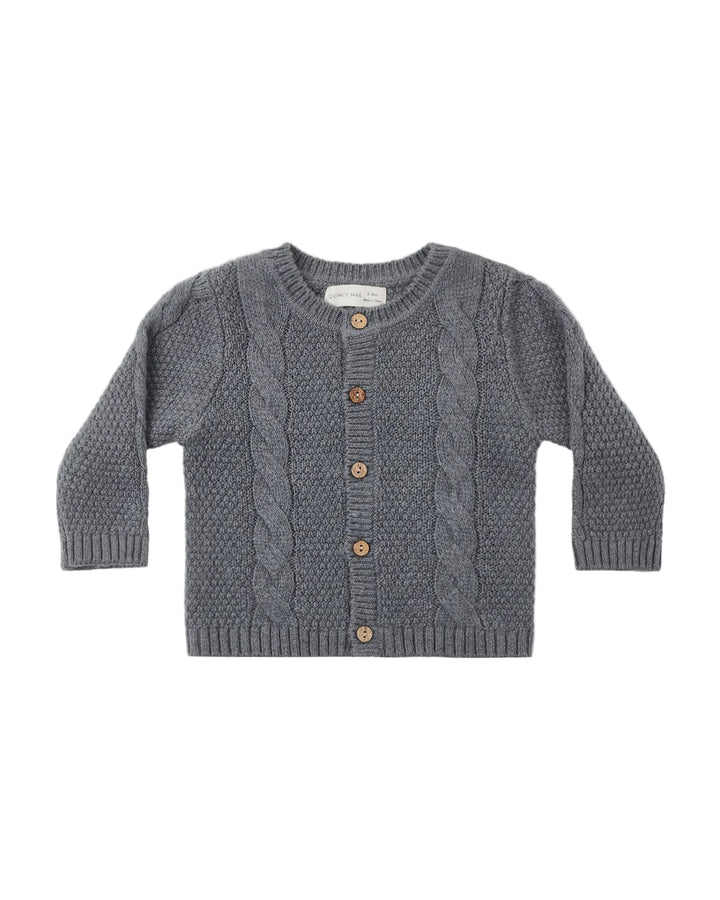 A gray cable-knit cardigan sweater for toddlers, featuring a button-up front with brown wooden buttons, laid flat on a light gray background.
