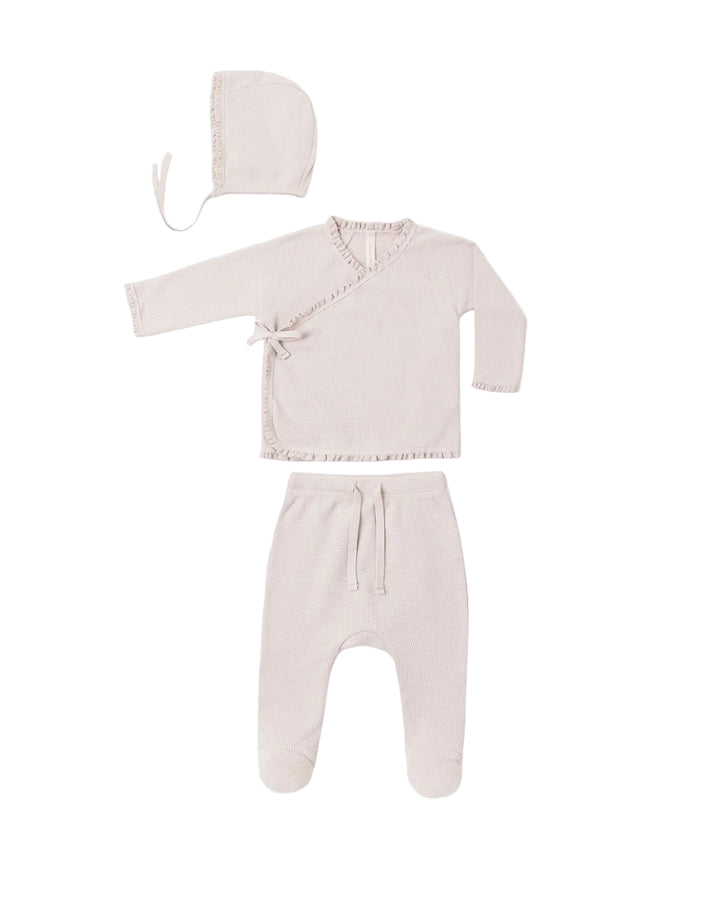 Quincy Mae Take Home Set is made from soft, lightweight waffle fabric and designed with newborn comfort in mind. This sweet set includes a bonnet, wrap snap and tie top, and footed drawstring pants for a cozy first outfit.