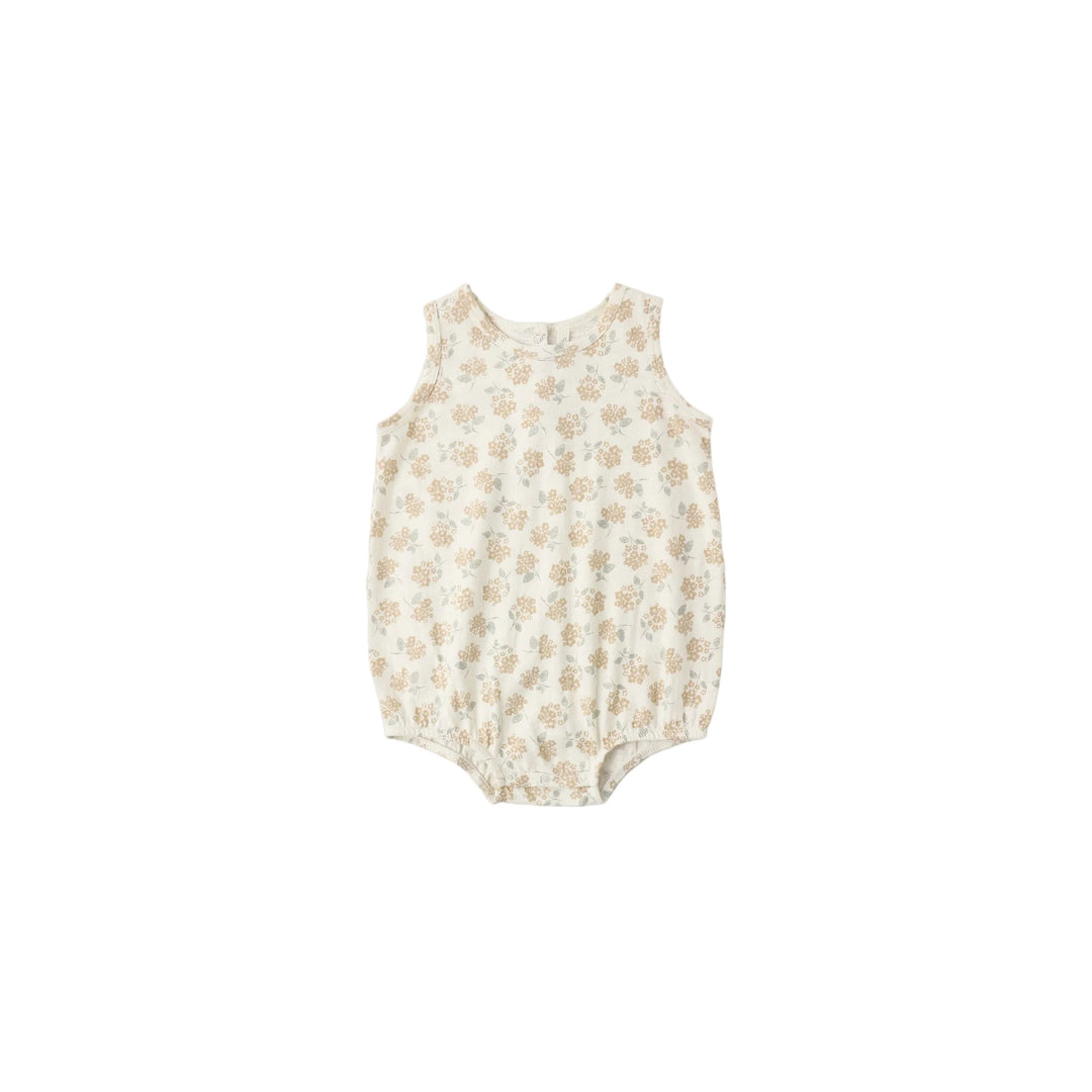 Baby romper with floral pattern on a white background