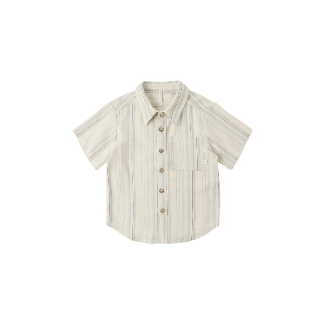 A classic Rylee + Cru collared boys short sleeve button-down shirt with coconut buttons.

Featuring a ‘sea stripe’ pattern. Slide into summer in this cool stripe style.