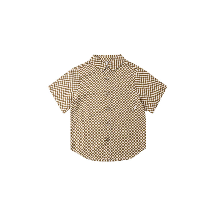 A classic Rylee + Cru collared boys short sleeve button-down shirt with coconut buttons.

Featuring a ‘ocre check’ pattern. Slide into summer in this cool vintage style.