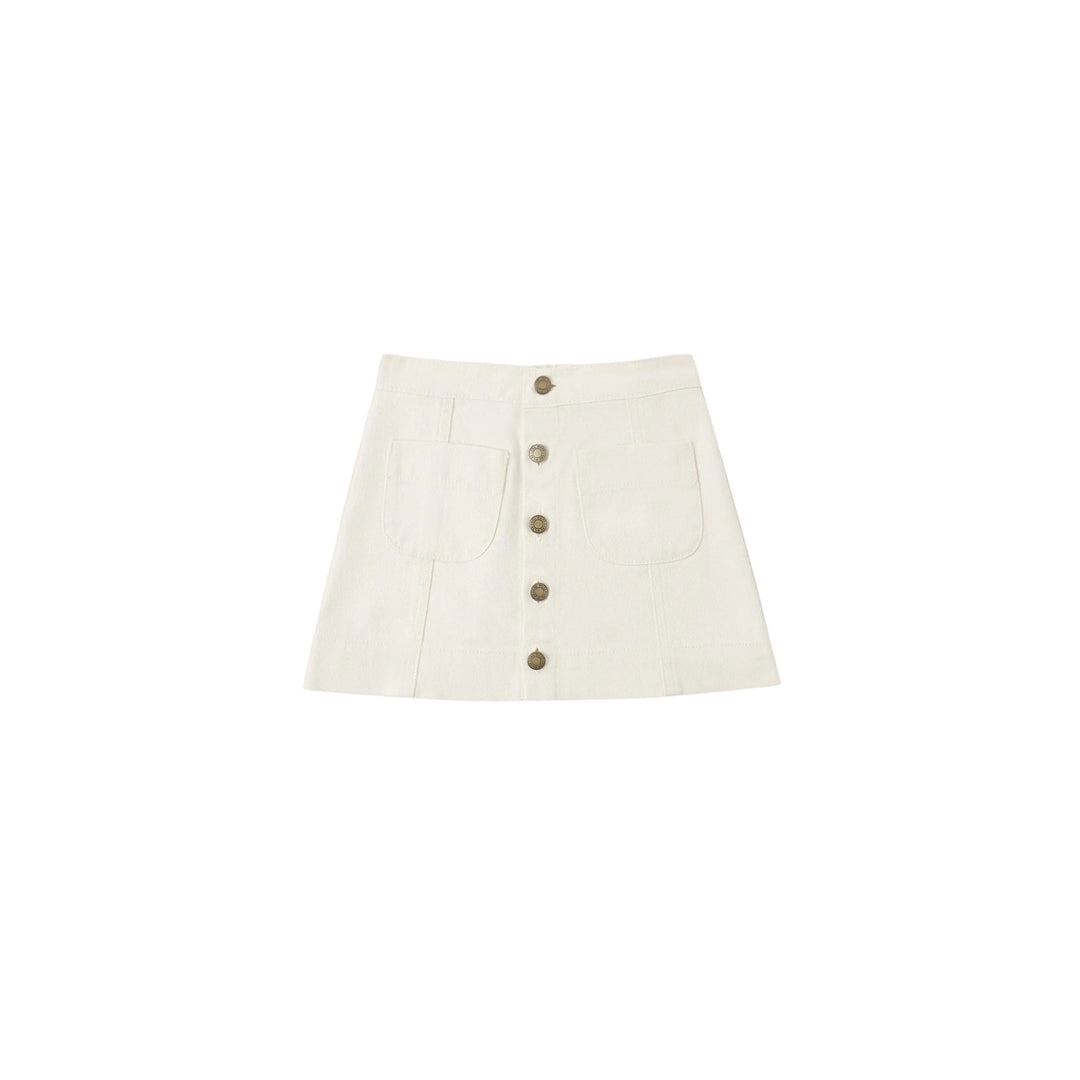 White skirt with button details on a white background