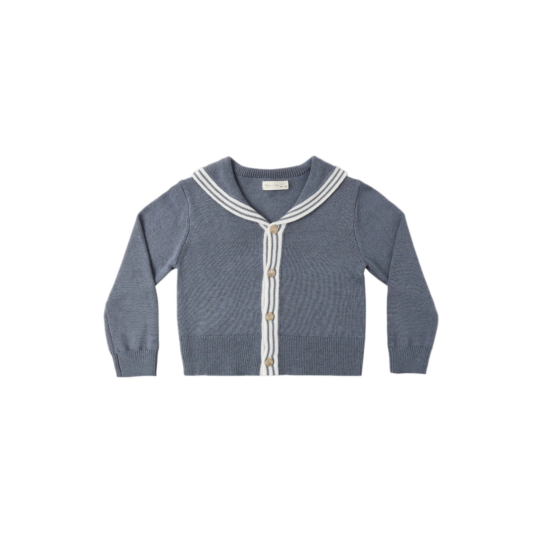 Rylee + Cru Blue knit sailor cardigan with white trim on a white background