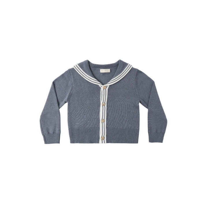 Rylee + Cru Blue knit sailor cardigan with white trim on a white background