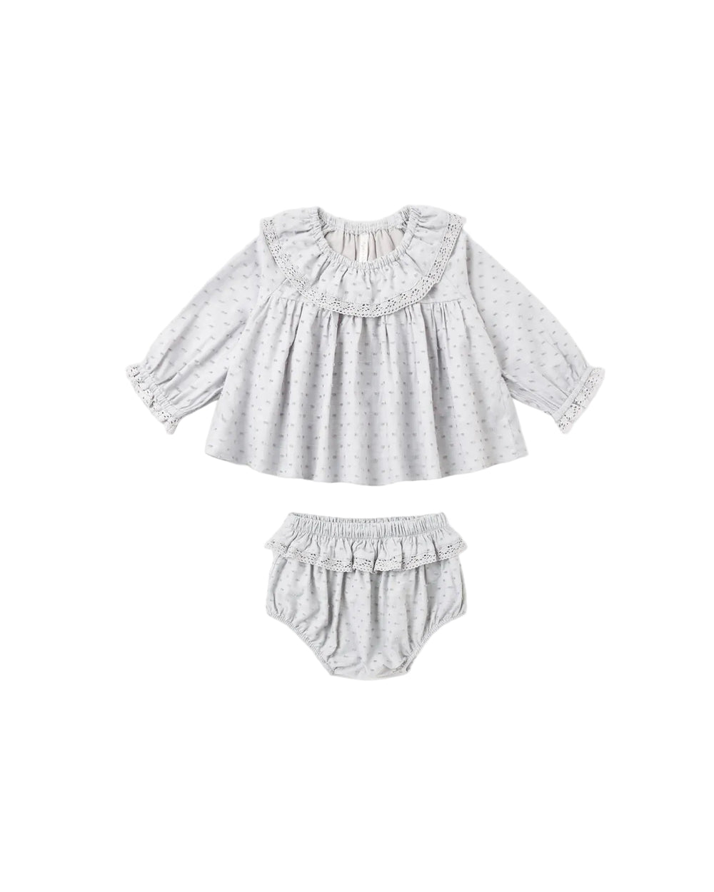 A baby girl's two-piece outfit set consisting of a long-sleeve blouse and matching bloomers, both in a light gray and white micro-dot pattern. The blouse features a ruffled collar and cuffs, and the bloomers have a ruffled waistband.