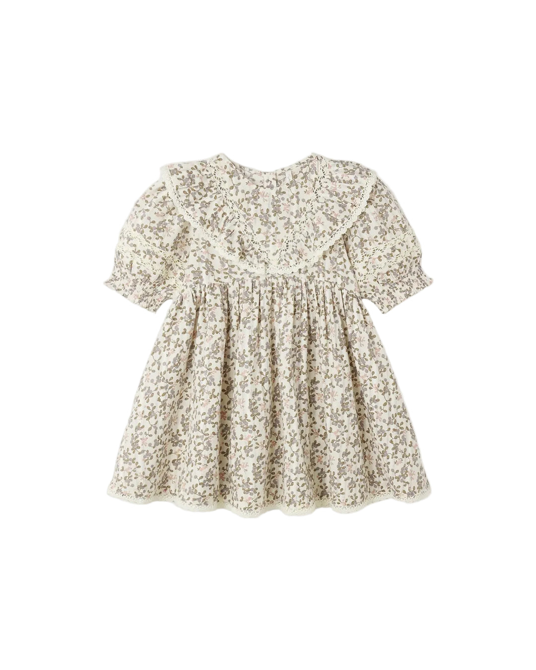 A short-sleeve baby dress with a beige and white floral print, featuring a ruffled collar and a gathered smocked bodice, shown against a plain light gray background.