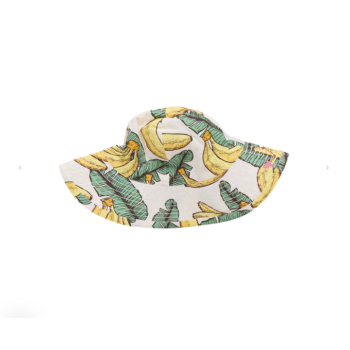 Bucket hat with banana leaf pattern on a white background