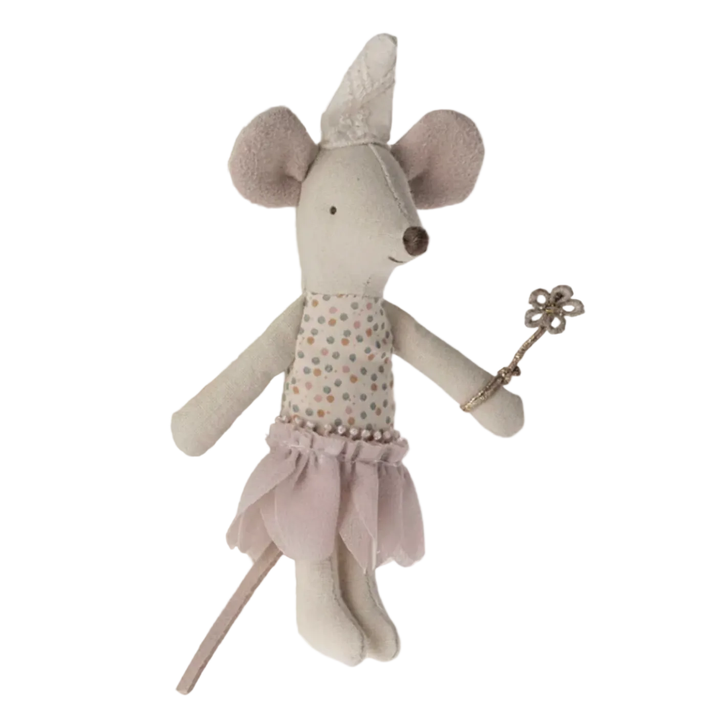 Stuffed mouse toy with a dress and wand on a white background