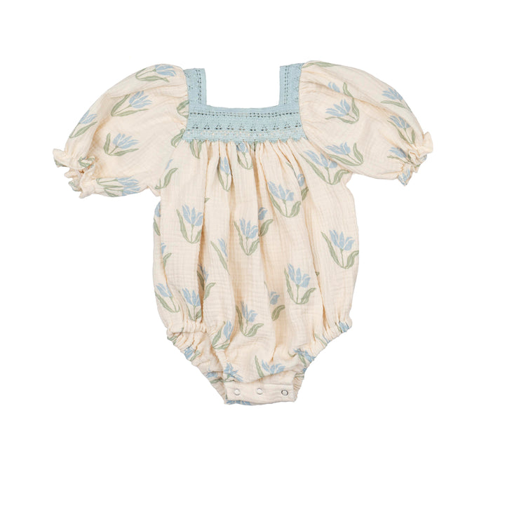 Baby romper with floral pattern on a white background