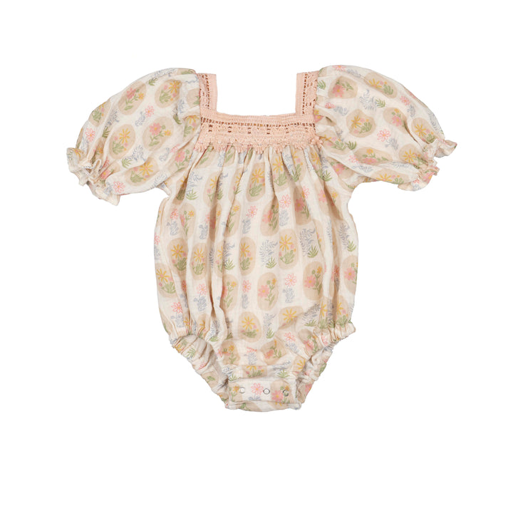 Floral baby romper with puff sleeves on a white background