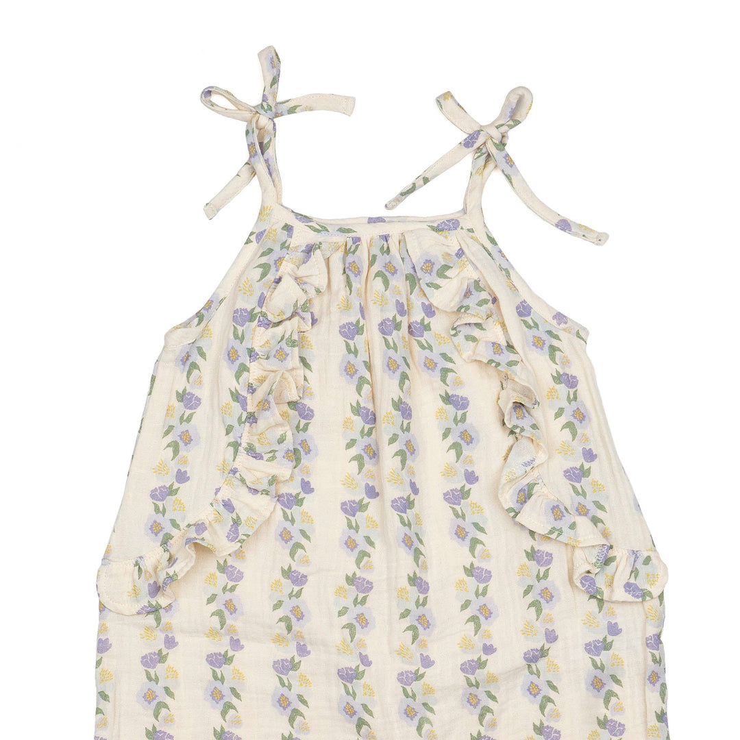 Floral-patterned baby romper on a white background