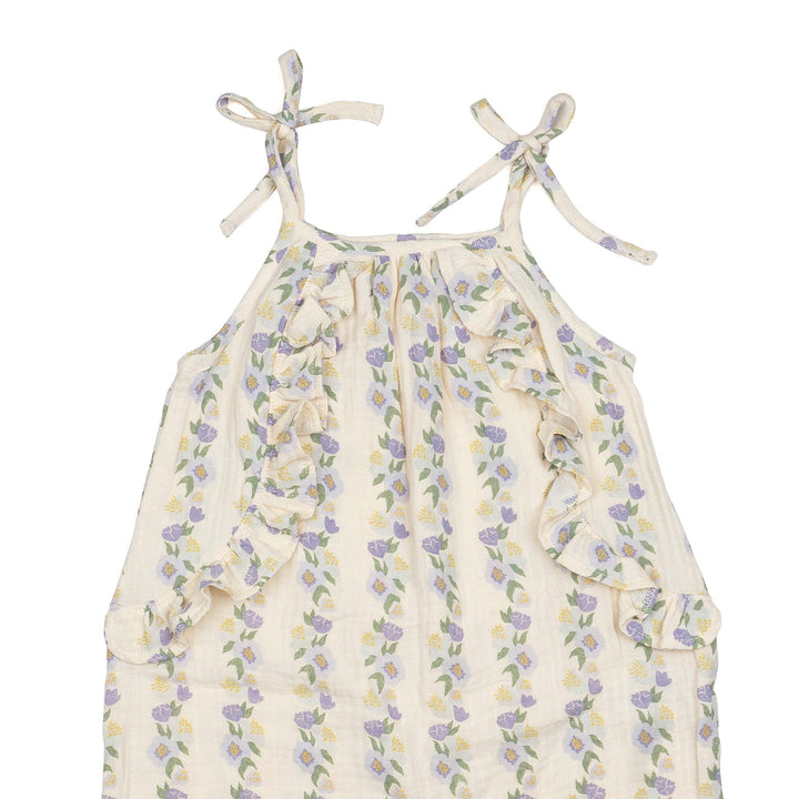 Floral-patterned baby romper on a white background