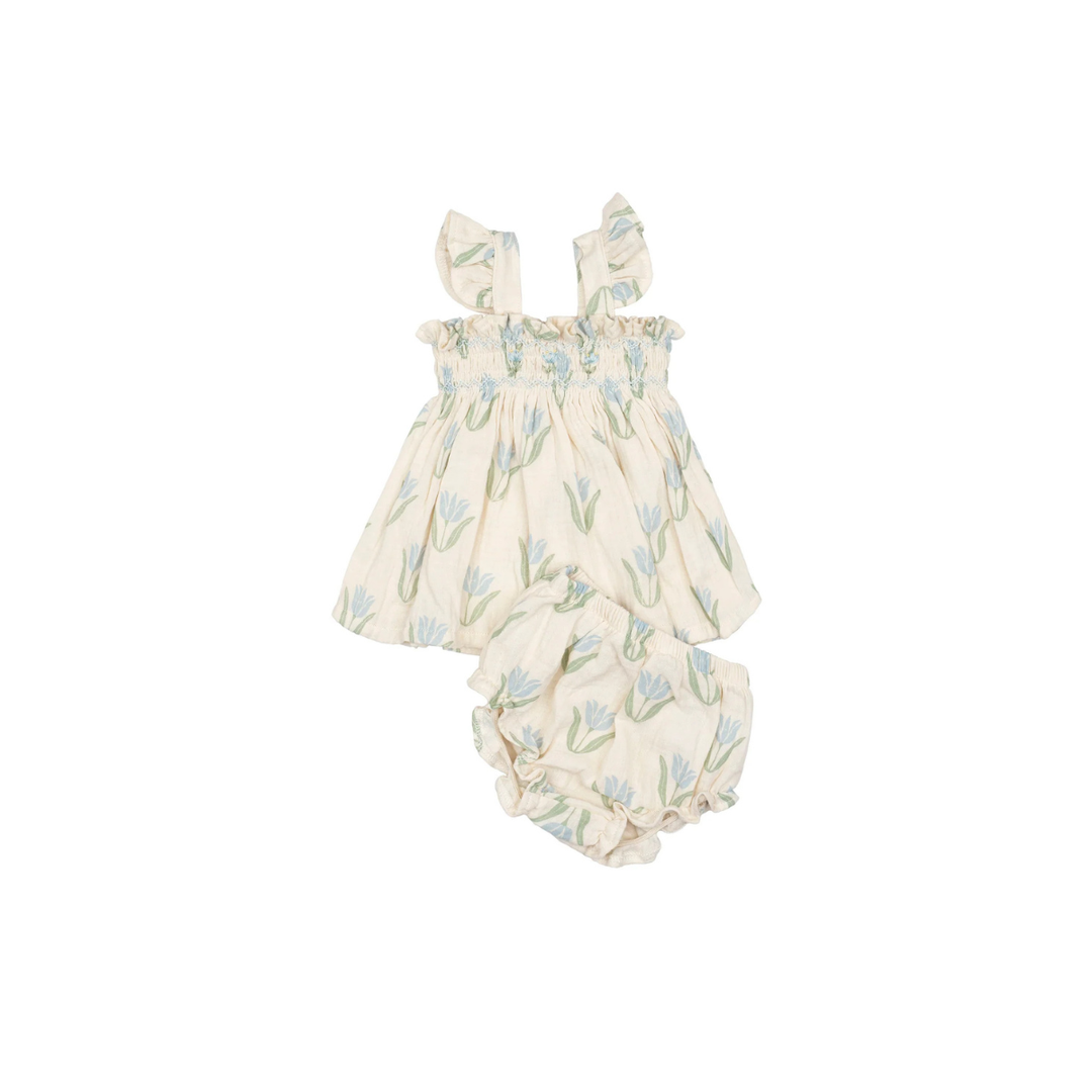 Hand-smocked flutter tunic and bloomers set in Blue Tulip print on a white background.
