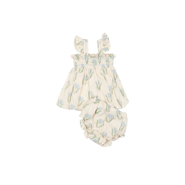 Hand-smocked flutter tunic and bloomers set in Blue Tulip print on a white background.