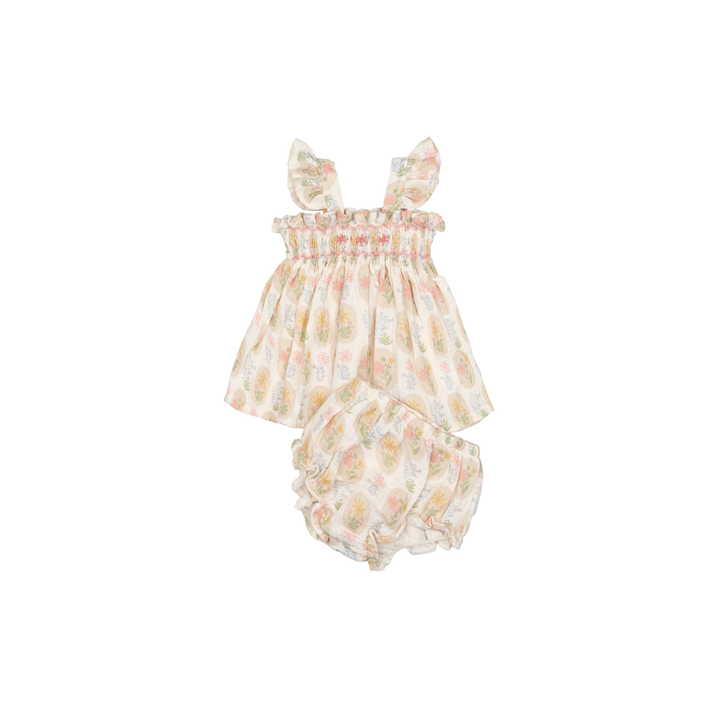 Hand-smocked flutter tunic and bloomers set in Early Blooms floral print on a white background.