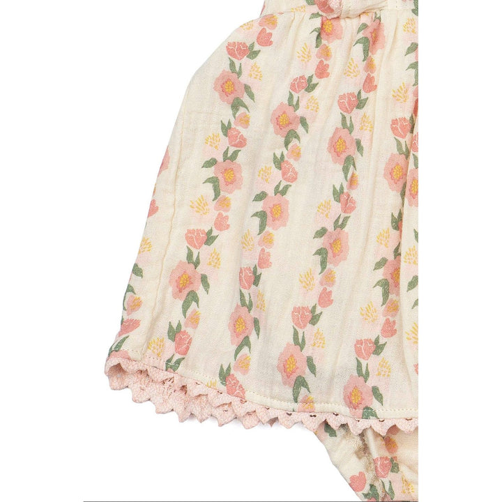 Floral baby romper on a white background