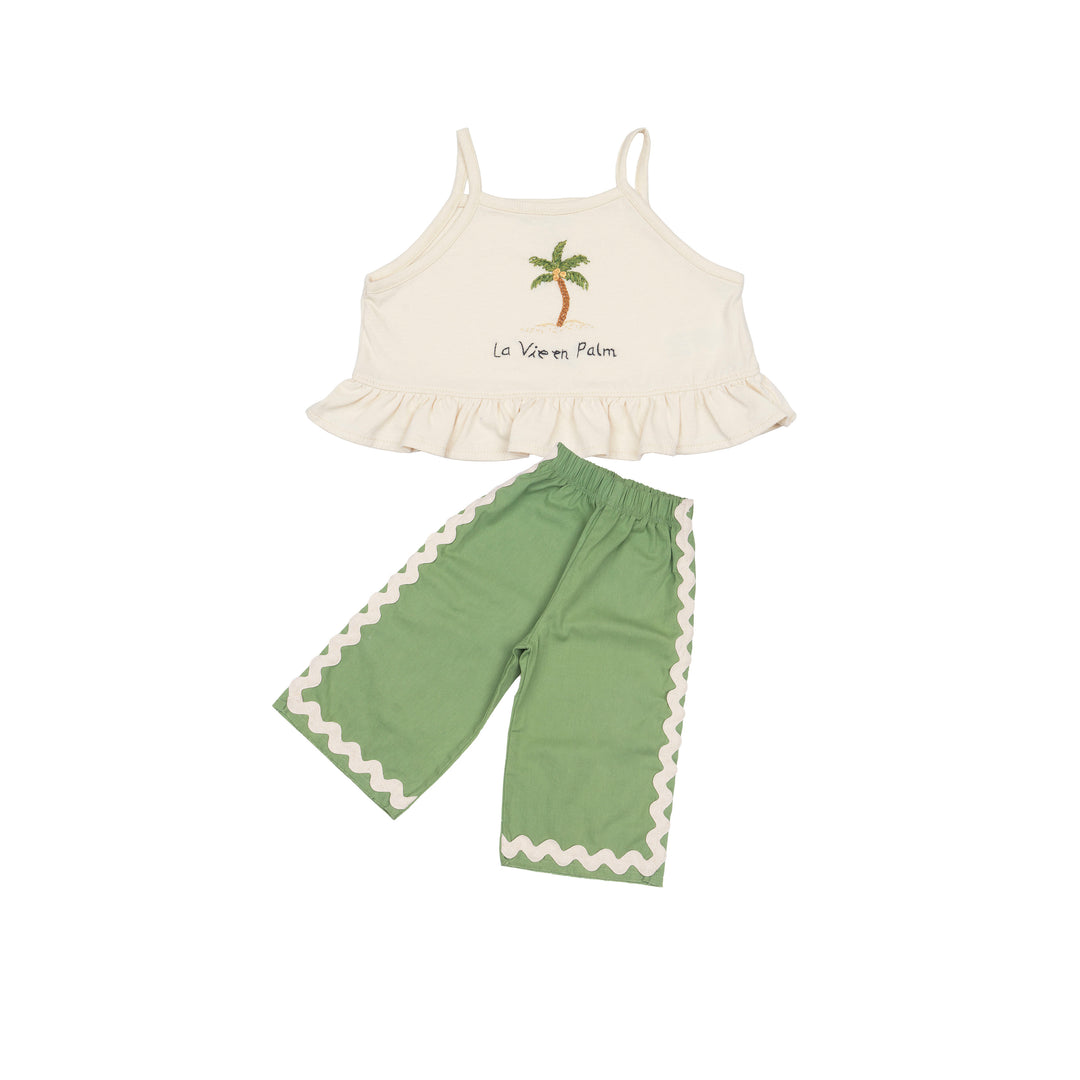 Children's outfit with white top and green pants with a ric rac edge 