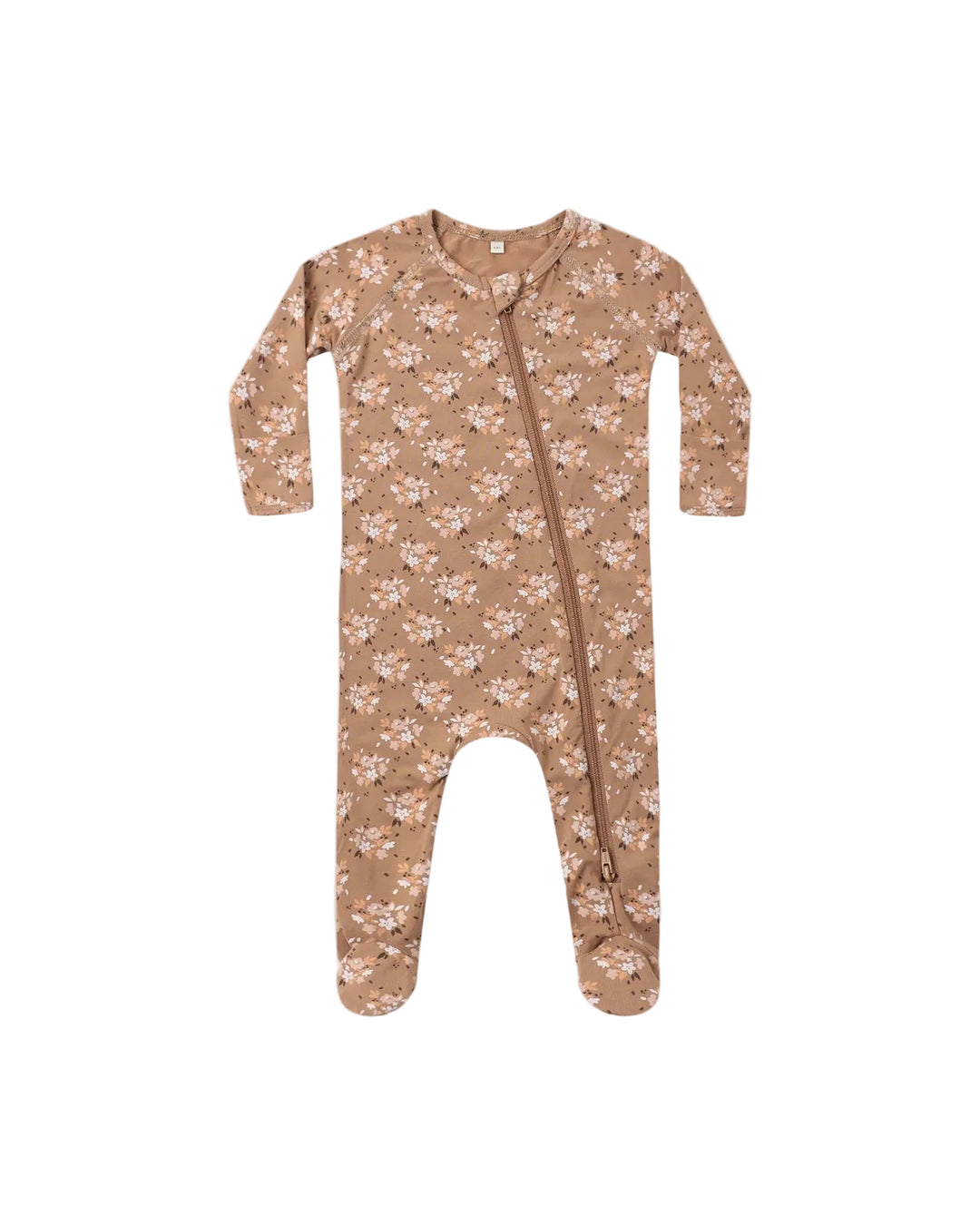 A baby footed one-piece sleeper in a warm tan color with a delicate pink and white floral pattern, featuring a front zipper closure, shown on a plain light gray background.