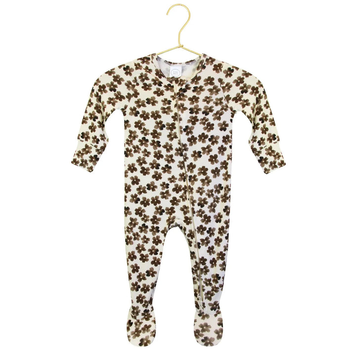 Floral-patterned baby onesie on a hanger with a close-up of the pattern.
