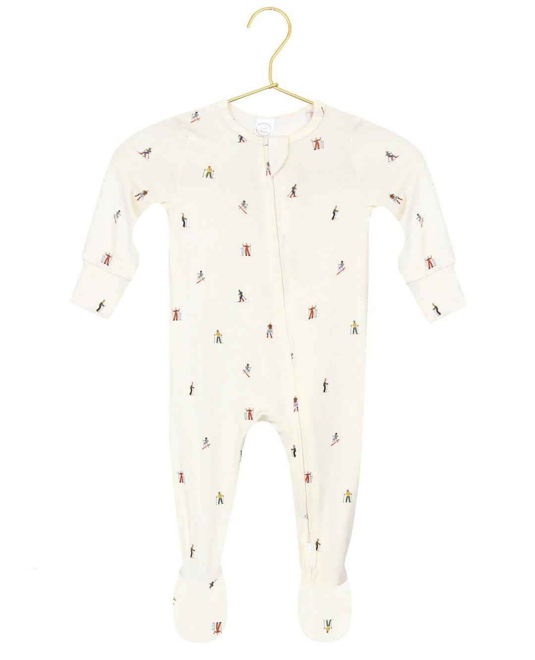 Baby onesie with small print on a hanger against a white background