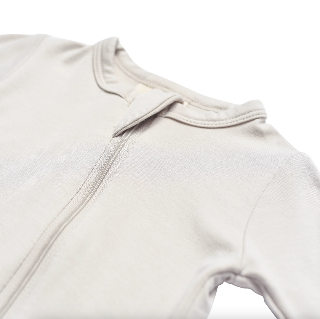 KYTE BABY zippered footie in oat